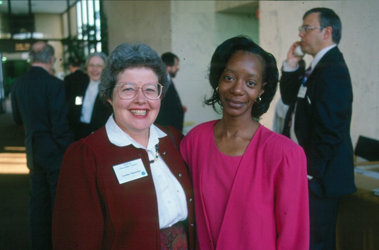 Dr. Caroline Hannaway (L), pictured with Dorothy Jones (R) of the NIH Historical Office at the NIH "AIDS and the Public Debate" conference (1993).
