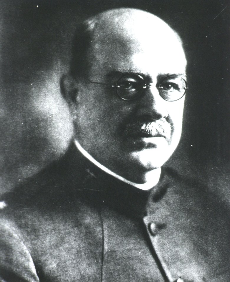 Black and white image of a man in a uniform